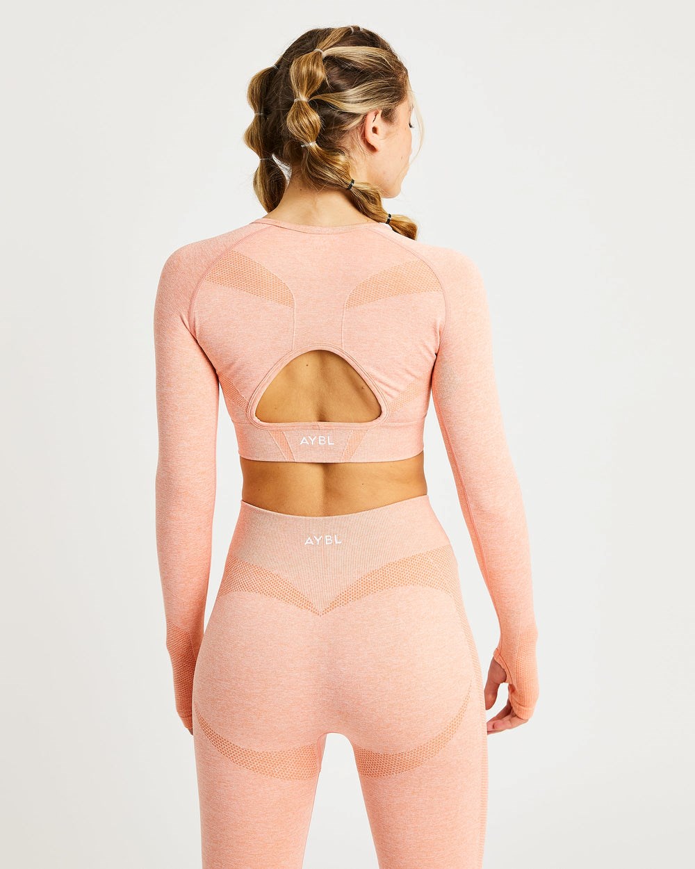 AYBL Motion Seamless Long Sleeve Crop Top Peach Marl | 3618207-TZ