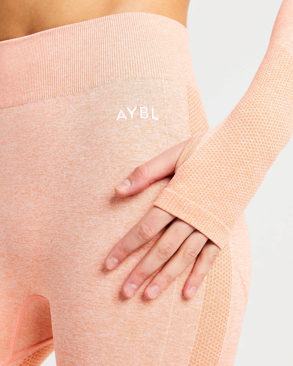 AYBL Motion Seamless Long Sleeve Crop Top Peach Marl | 3618207-TZ